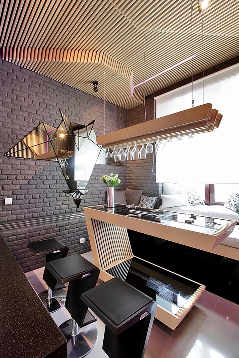 Креативный дизайн интерьера кухни из деревянных реек от Geometrix