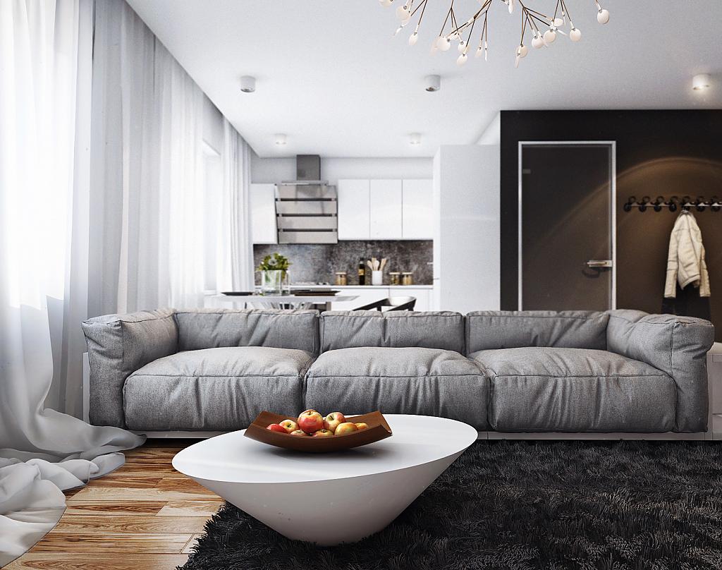 Мягкий серый диван в стильном интерьере белой кухни